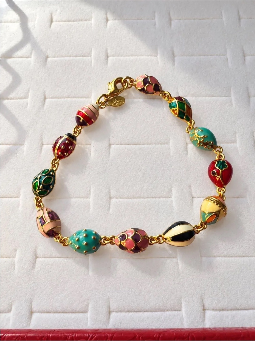1990s Joan Rivers golden egg charm bracelet collectible